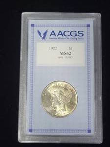 lot 10 image: Silver 1922 Peace Dollar Graded by AACGS MS62