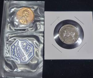 lot 117 image: Two Proof Coins With Mint Medallion