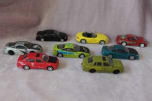 lot 26 image: Eight Racing Champions Toy Cars