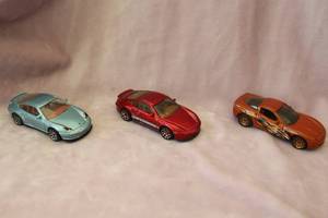 lot 99 image: Three Matchbox Toy Cars
