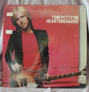 lot 5 image: Tom Petty and the Hearbreakers Dam the Torpedoes 78 RPMs 12 Inch Vinyl Record with Cover