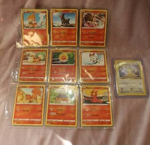 lot 142 image: Pokemon Cards Set of Nine with Original Meowth