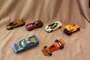 lot 176 image: Six Toy Cars including Four Hotwheels Cars