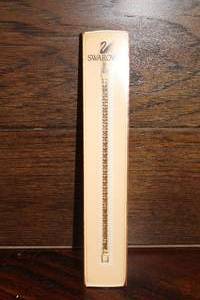lot 32 image: Swarovski Crystal Chocolate Tennis Bracelet with Box