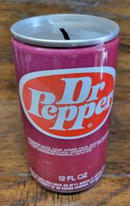 lot 94 image: Vintage Collectible Dr Pepper Coin Bank with Coins Weighing at 218 Grams