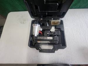 lot 87 image: Porter Cable brad nailer air gun in case