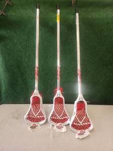 lot 202 image: Juice Jr lacrosse sticks - qty. 3