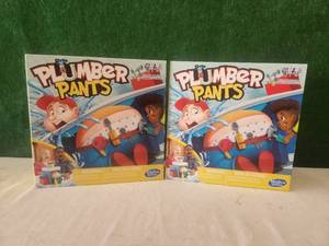 lot 210 image: Plumber pants games - qty. 2 - unopened