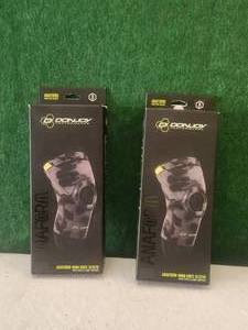 lot 212 image: Donjoy anaform 4mm knee sleeve - qty. 2