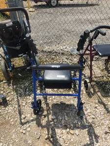 lot 240 image: Drive steel folding rollator walker with seat