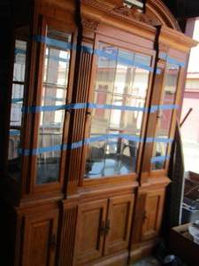lot 5 image: Brown hutch 4 doors on bottom 3 doors on top  87x62x16 2 piece very beautiful