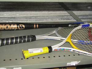 lot 38 image: 2 tennis rackets and a baseball bat