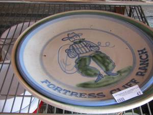 lot 47 image: cowboy platter 15 12 in diameter by M.A. Hadley, decorative platter 17 12 in diameter by CaLeca