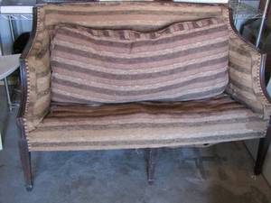 lot 30 image: Antique brown loveseat