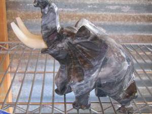 lot 78 image: very beautiful gray stone looking elephant