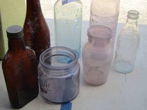 lot 81 image: vintage medicine bottles, canisters