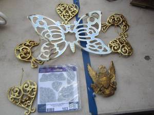 lot 103 image: gold ornaments, metal butterfly