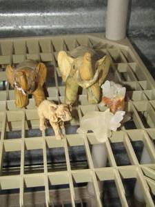 lot 90 image: rock stone elephants, paper Mache elephants