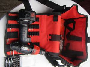 lot 25 image: black and decker drill with various drill bits