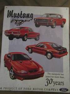 lot 26 image: metal mustang sign from ford motor company 16x13