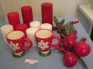 lot 203 image: 2 Christmas cups, red and white candles, apple dcor