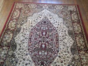 lot 229 image: Area rug color maroon design #14008 4ft 11 x 7ft 3 original price $99.99  Garden Ridge