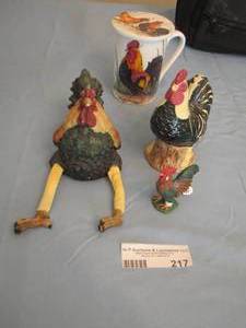 lot 217 image: rooster dcor figurines qty 3, 1 of their heads is broke, rooster coffee cup