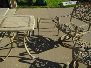 lot 251 image: Cast-ALUMINUM Patio set  2 swivel chairs, 1 matching table and 2 foot stools