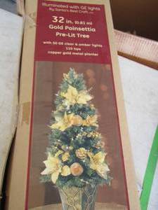 lot 262 image: 32 in gold poinsettia pre lit tree