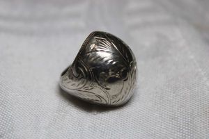 lot 32 image: Sterling Silver  -  Dome Ring marked Sterling 925 size 6.5 weighs 5g