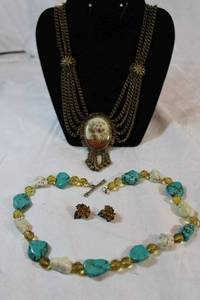 lot 19 image: White and turquoise beaded Howlite necklace, vintage clip earrings, Vintage Courting couple cameo pendant necklace with multiple chains
