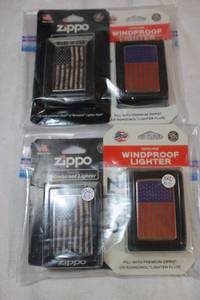 lot 21 image: 4 Zippo Flag lighters still in packaging
