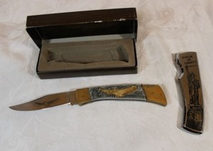 lot 24 image: Pocket knives American Eagle with brass tips Browning knife, Statue of Liberty 7 Souvenir knife