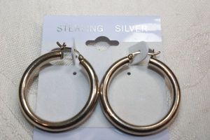 lot 58 image: Sterling Silver - 1 Hoop earrings marked 925