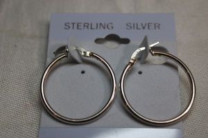 lot 60 image: Sterling Silver - 1 Hoop earrings marked 925