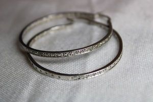 lot 64 image: Sterling Silver - Silver hoops with chip beads hinged hoop closures marked 925