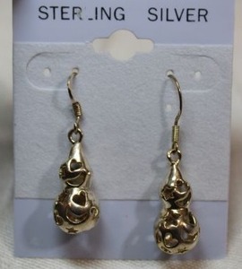 lot 67 image: Sterling Silver - Gold finish earrings with star, heart, and moon shape cutouts