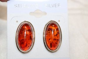 lot 70 image: Sterling Silver - Amber oval earrings marked 925