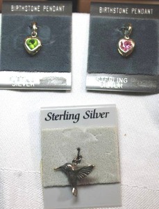 lot 80 image: Sterling Silver - 2 birthstone pendants and silver hummingbird pendant