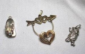 lot 88 image: Sterling Silver - pendant selection with flipflop, heart, and owl