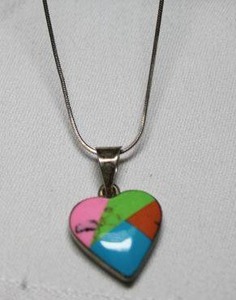 lot 93 image: Sterling Silver - multicolored heart pendant marked Mexico 925 on silver chain