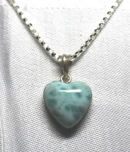 lot 99 image: Sterling Silver - Blueish green heart pendant on silver necklace