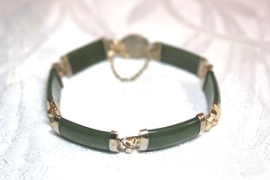 lot 116 image: Sterling Silver - Jade or Jadeite panel bracelet, clasp marked 925, weight 14.2g