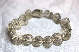 lot 120 image: Sterling Silver - Heart filigree link bracelet, weight 8.1g
