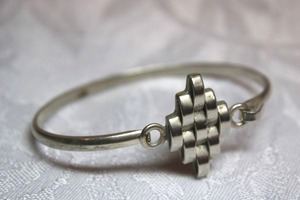 lot 122 image: Sterling Silver - Silver bangle bracelet marked Mexico 925, weight 16.3g