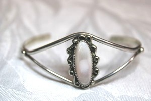 lot 124 image: Sterling Silver - Bangle bracelet with white stone, marked 925, width 2.5