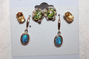 lot 75 image: Sterling Silver - 3 sets of earrings - blue stone earrings marked 14K585, green stone post earrings marked 925