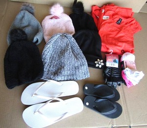 lot 302 image: Assorted ladies name brand clothes and flip flops (never worn like new), some still with store tags