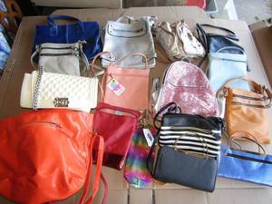 lot 321 image: Assorted hand bags and purses as shown
