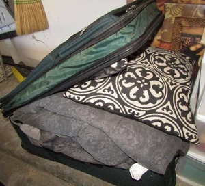 lot 330 image: Stingray suitcase plus pillows and comforters